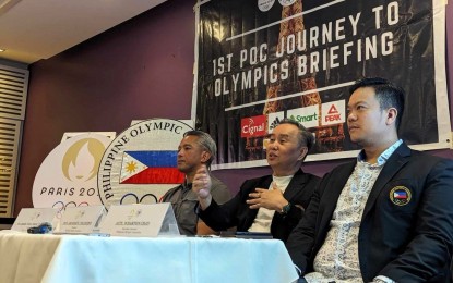<p><strong>OLYMPIC TALK</strong>. Philippine Olympic Committee (POC) president Abraham "Bambol" Tolentino (center) presides over the first POC Journey to Olympic briefing at the Milky Way Restaurant in Makati on Friday (April 12, 2024). With him are Team Philippines chef de mission Jonvic Remulla (left) and POC secretary-general Atty. Wharton Chan. <em>(Contributed photo) </em></p>