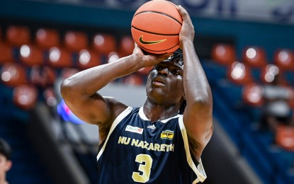 <p><strong>DOUBLE-DOUBLE.</strong> Reigning MVP Collins Akowe of National University Nazareth School aims for the basket during the game against De La Salle-Zobel in the UAAP Season 87 boys basketball tournament at the Filoil EcoOil Centre in San Juan on Thursday (Jan. 23, 2025). Akowe delivered 21 points and 21 rebounds to lead the Bullpups to a 91-69 win. <em>(UAAP photo)</em></p>