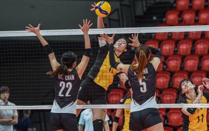 <p><strong>TOP SCORER.</strong> Peng Yu-Rou of Taipei's Kaohsiung Taipower (center) tries to score against Hong Kong's Hip Hong in the Asian Volleyball Confederation Women's Champions League at Philsports Arena in Pasig City on Sunday (April 20, 2025). Peng led the Taipower to victory, 25-10, 25-16, 25-14. (<em>PVL photo)</em></p>