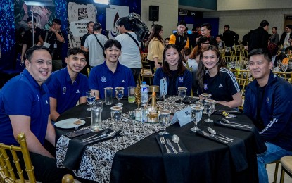 <p><strong>READY.</strong> National University is determined to retain the men's and women's collegiate volleyball titles. From left are men's head coach Dante Alinsunurin, Michaelo Buddin, Rwenzmel Taguibolos, Erin Pangilinan, reigning MVP Bella Belen and women's head coach Sherwin Meneses. <em>(UAAP photo)</em></p>