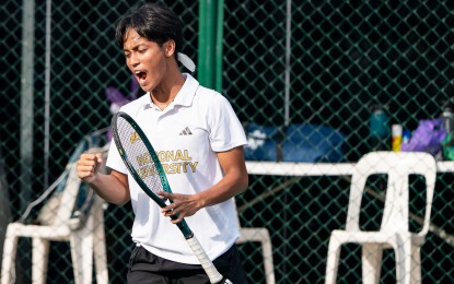 <p><strong>HEADED TO THE CHAMPIONSHIP.</strong> National University's Andrei Padao reacts after winning the first singles match over University of the Philippines' Aslan Carbonilla, 6-0, 6-0, in the UAAP Season 87 tennis semifinals at Felicisimo Ampon Tennis Center in Manila on Sunday (April 6, 2025). The Bulldogs won the best-of-five tie, 3-1, to forge a title showdown with University of Santo Tomas. <em>(UAAP photo)</em></p>