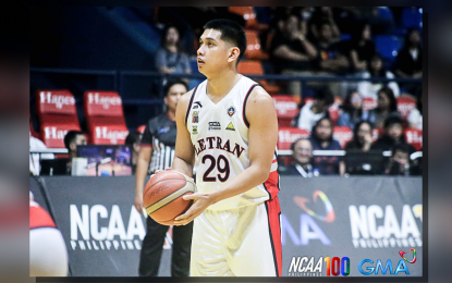 <p><strong>LETRAN LEADS.</strong> Letran's Vince Cuajao (No. 29) prepares to make a free throw during the game against San Sebastian College-Recoletos in the National Collegiate Athletics Association (NCAA) Season 100 men's basketball tournament at the Filoil EcoOil Arena in San Juan on Tuesday (Oct. 22, 2024). The Knights won in double overtime, 101-98. <em>(NCAA photo) </em></p>