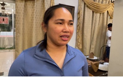<p><strong>OLYMPIC GOLD MEDALIST.</strong> Hidilyn Diaz talks about the role of education in developing future weightlifters, at a press conference on Friday (Feb. 21, 2025) in Ilocos Norte. She also said weightlifting should be a regular event in the Palarong Pambansa. <em>(PNA photo by Leilanie Adriano)</em></p>